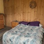 Queen bed in Serene natural building